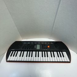 Casio SA-76 Electronic Keyboard Mini Piano 100 Tones - Black/Orange - Tested