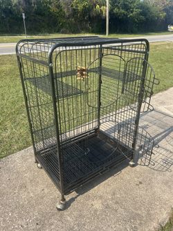 Bird cage It has two doors It's 37 tall It's 25 wide