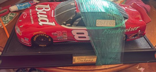 Porcelain made nascar car on placker