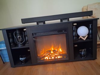 T.V Stand for 65' TV.  With Fireplace