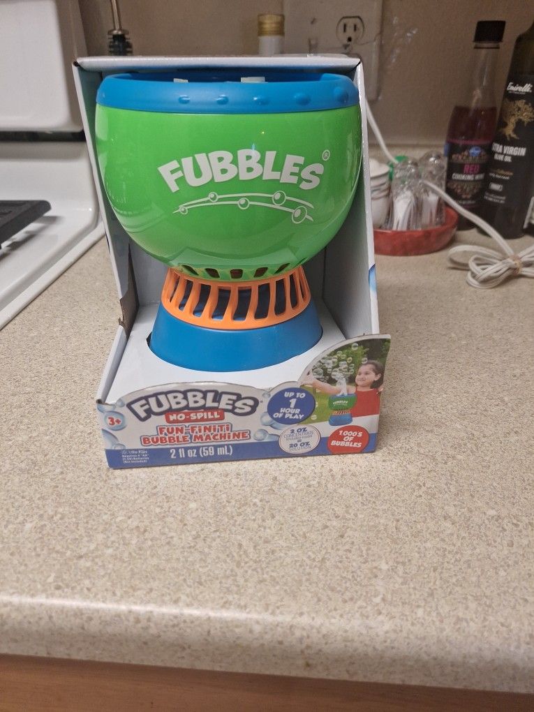 NEW FUBBLES BUBBLE MACHINE. $20 FIRM PRICE