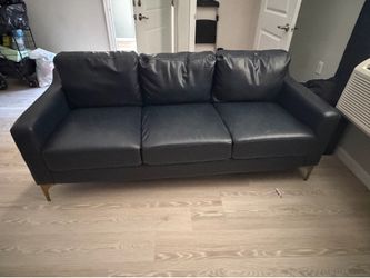 For sale blue leather sofa