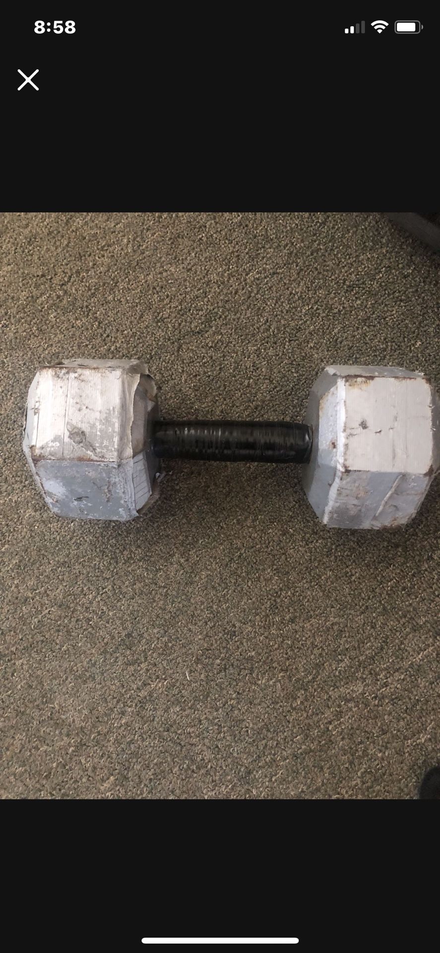 30 pound barbell weight. Electric tape as cushioning for hand which is better