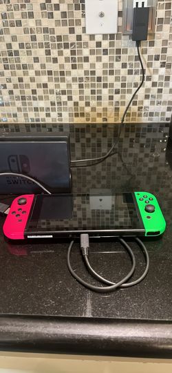 Nintendo Switch w/two sets of controllers