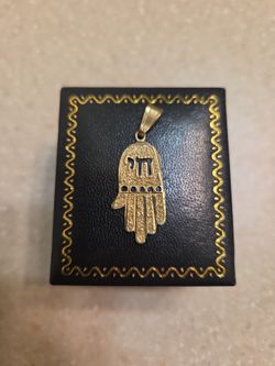 14 k gold pendant.  Made in Israel.  Weight is 1.2 grams
