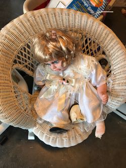 Antique wicker doll chair