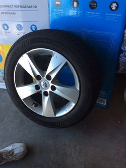 Douglas Performance-all season tire with rim.