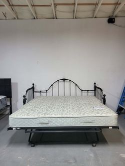 Black modern  trundle bed with mattresses. Delivery options available.