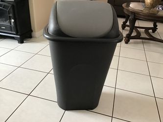 Large plastic trash can, clean and in good condition.