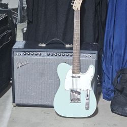 Fender guitar amp and guitar.
