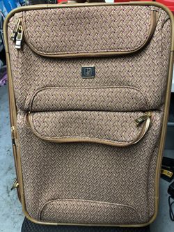 DvF Rolling Carry on and matching Purse