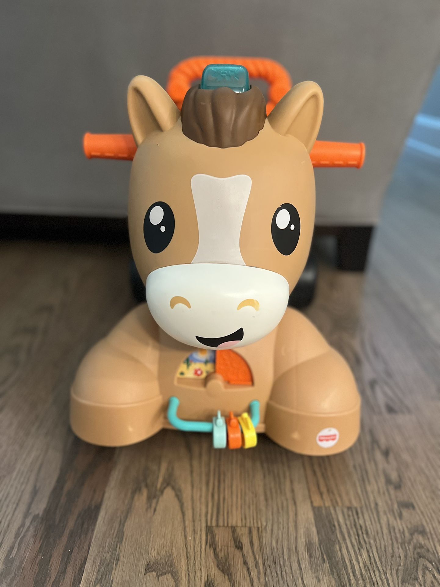 Fisher-Price walk, bounce and ride Musical walker pony Everything works great