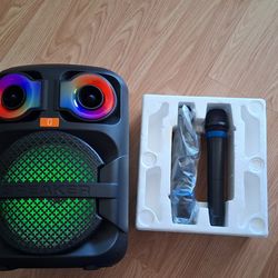 Portable Speaker with Microphones