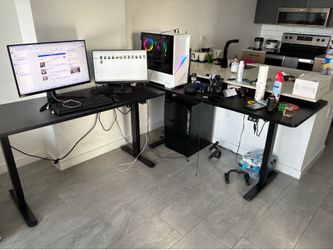 2 electric height adjustable tables