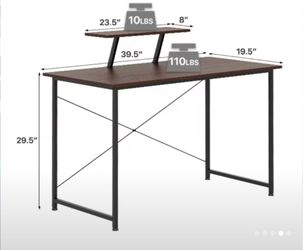 2 Tier Computer Desk With An Office Chair.