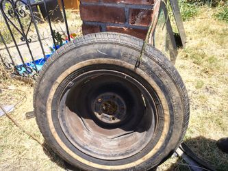 205/75r15 in good condition with rim. Rim has five holes