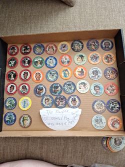 137 - Collectible Pogs, Coins, Slurpee Baseball Football