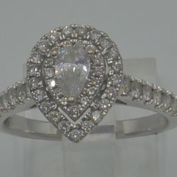 14KT WHITE GOLD ENGAGEMENT RING 3.8 GRAMS ; 1.5 CARATS OF DIAMONDS SIZE 8.5 PRE OWNED