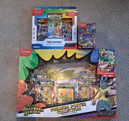 Sealed pokemon cards (Mega Lucario Premium Poster Collection, First Partner Series 3, Phantasmal Flames Booster Bundle