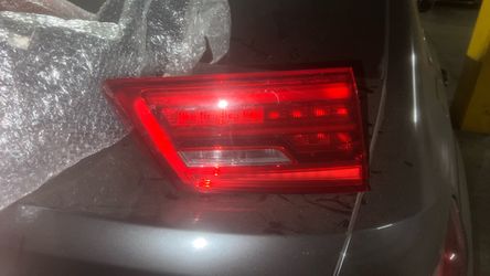 BMW OEM Rear Left (Driver Side) Inner Trunk-Mounted Tail Light Assembly for the BMW 5-Series (G30 generation, Pre-LCI model years 2017–2020).