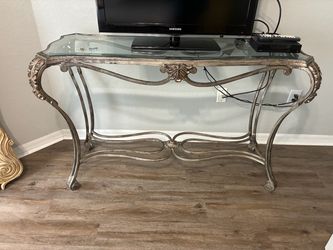 Long glass and metal table