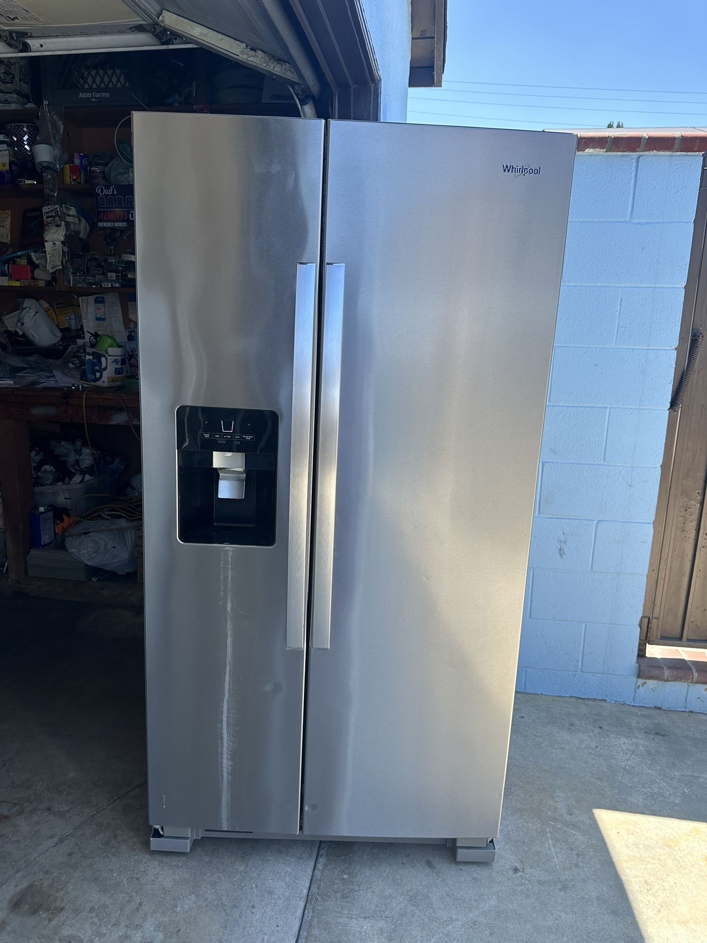 Refrigerator Whirlpool 25 CuFt .Stainless Steel Door Size :36” Wide By 70” High By .31” Depth .Water And Ice Dispenser .Works Perfectly .Glass Shelf .