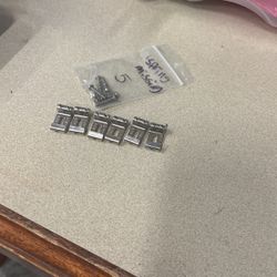 fender strat saddles