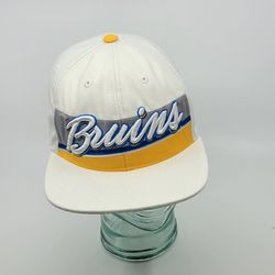 UCLA Bruins Blue White Gold Top of the World Acrylic Wool Baseball Hat 
Cap Snapback. Pre-owned, good shape, please see photos for details.
80% Acryli