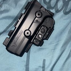 Left handed ShapeShift Paddle Holster for Glock 17 by Alien Gear Holsters
