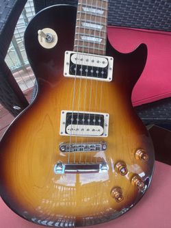 New 2012 Les Paul Studio Deluxe Guitar in antique Sunburst