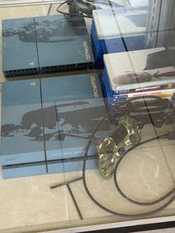 PS4 with multiple games, controllers and cable