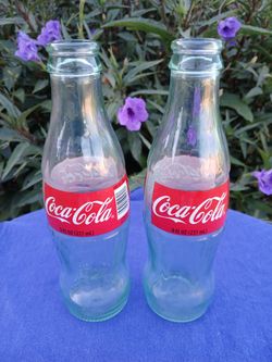 2 COCA-COLA BOTTLES