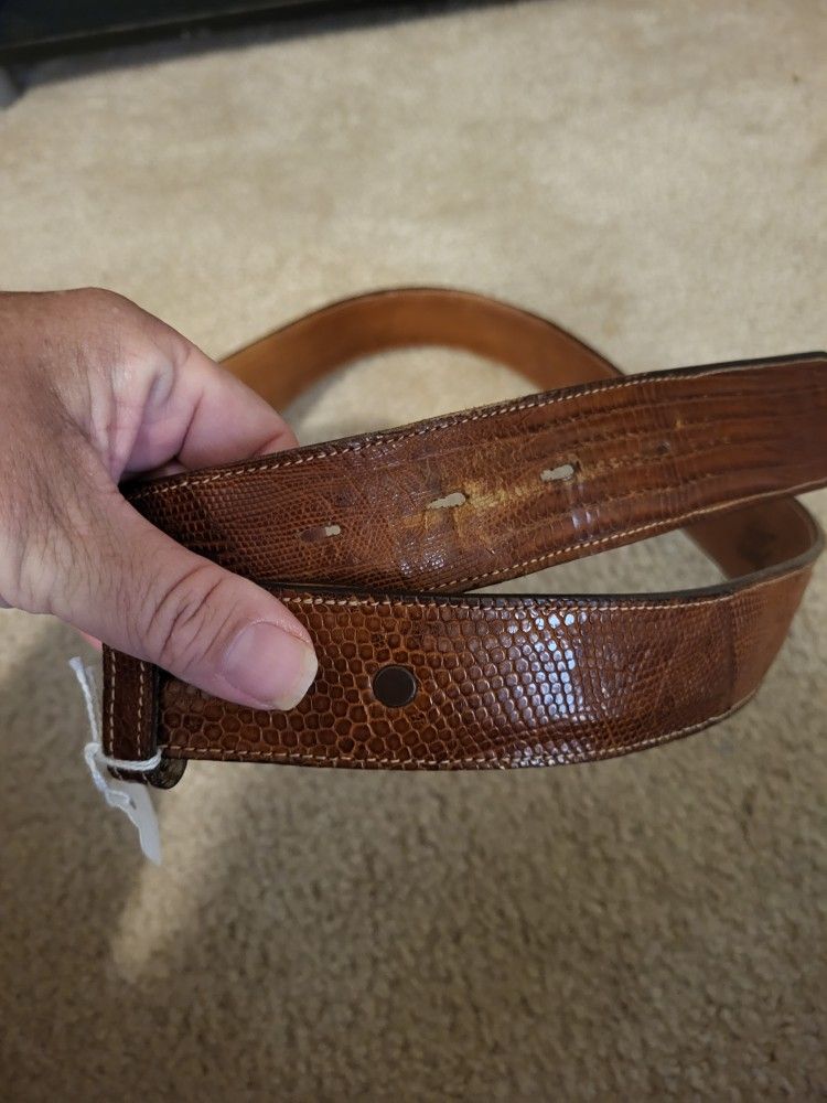 TONY LAMA stitched leather belt is made of genuine alligator lizard, in a rich brown color.