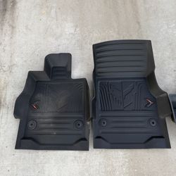 2024 chevrolet corvette Premium All-Weather Floor Liners in Jet Black with Crossed Flags Logo