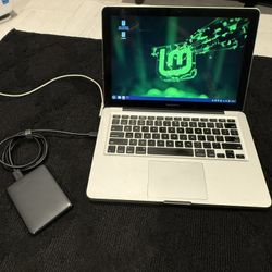 2011 MACBOOK PRO RUNNING LINUX MINT
