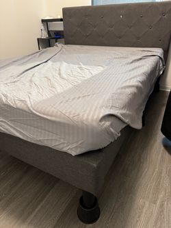 Queen size bed frame with used mattress