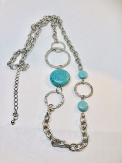 Silver tone necklace with turquoise colored stones