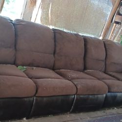 Lightly Used Sectional Sofa With Recliners and Middle Wedge Seat.