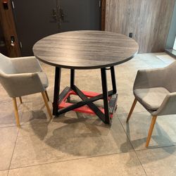Centiar Round Dining Table with X-Shaped Metal Base
