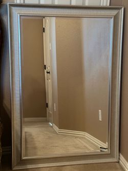Beautiful Vintage Wall Mirror. Size: 35 3/4 wide length 50 1/2