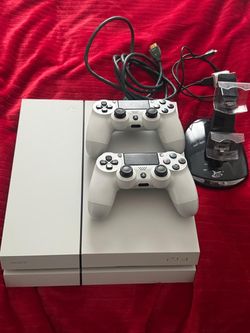 White Sony PS4 Console with Two Controllers