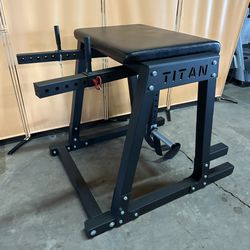 Near New Titan H-PND Reverse Hyper- Olympic Weight Plate Loaded 