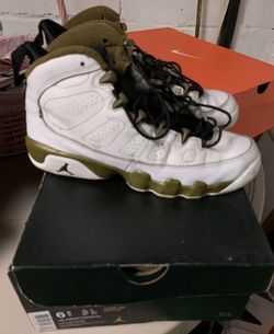 Green and white Jordans