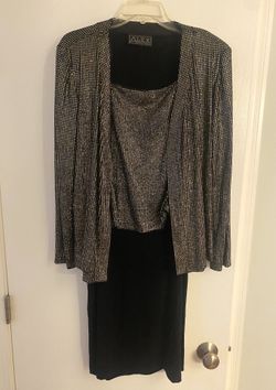Alex Evenings brand size: 12  2-piece dress/jacket set  In good condition  Perfect for a wedding!!!