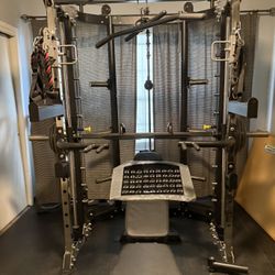 Smith Machine/ Free Weight Options/ Adjustable Cable / Squat Rack