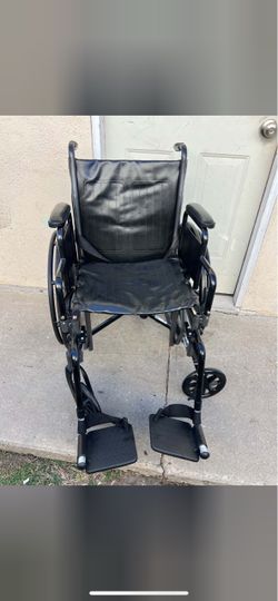 Black Folding Wheelchair with Footrests