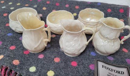 3 sets of vintage Belleek creamer & sugar. Different mark years