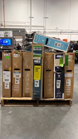 Assorted TVs with minor damage.