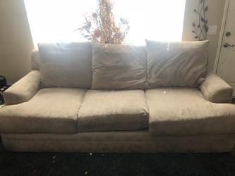 Beige couch, with ottoman