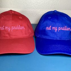 NEW! Novelty Hats Red & Blue “not my problem”